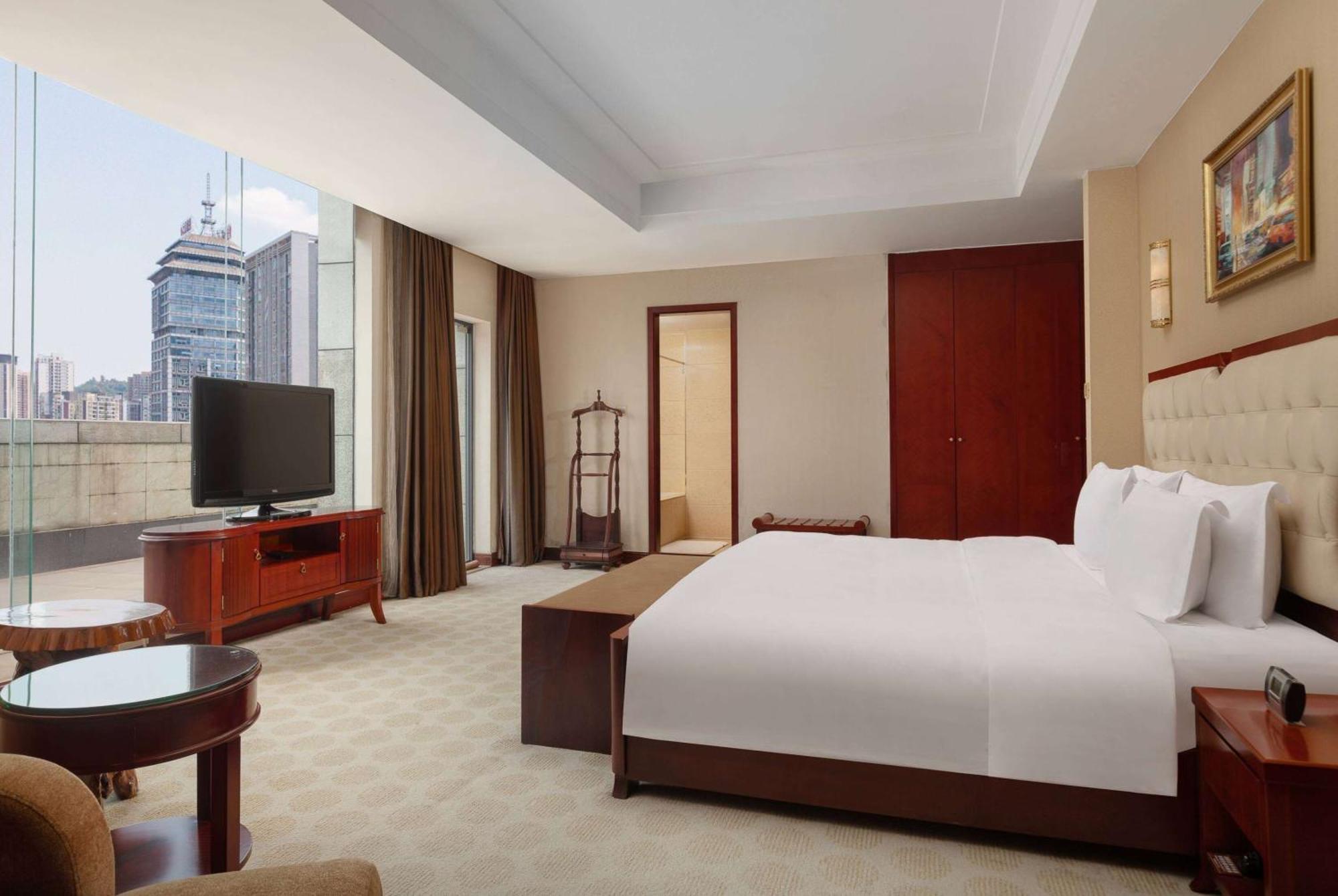 Ramada Plaza By Wyndham Chongqing West Hotel Exterior photo